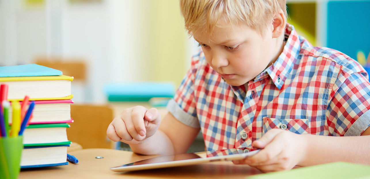 Small Step Learning - Banner of boy learning - small steps, big outcomes Special Education Tutoring for children with Learning Difficulties